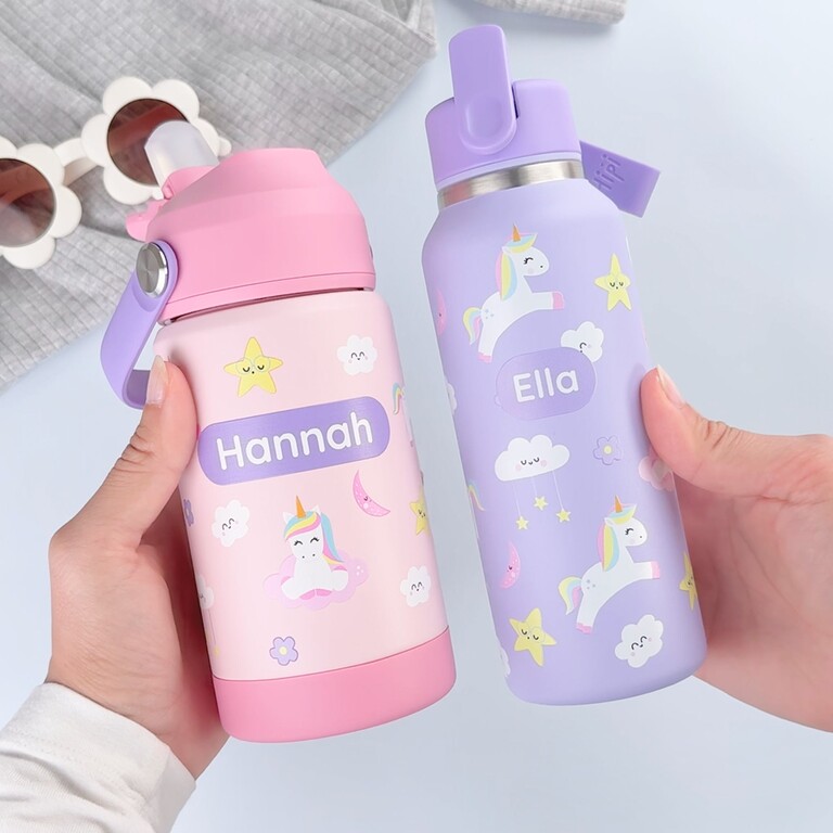 Personlig barnflaska och vattenflaska med enhörningsmotiv och namnen Hannah och Ella